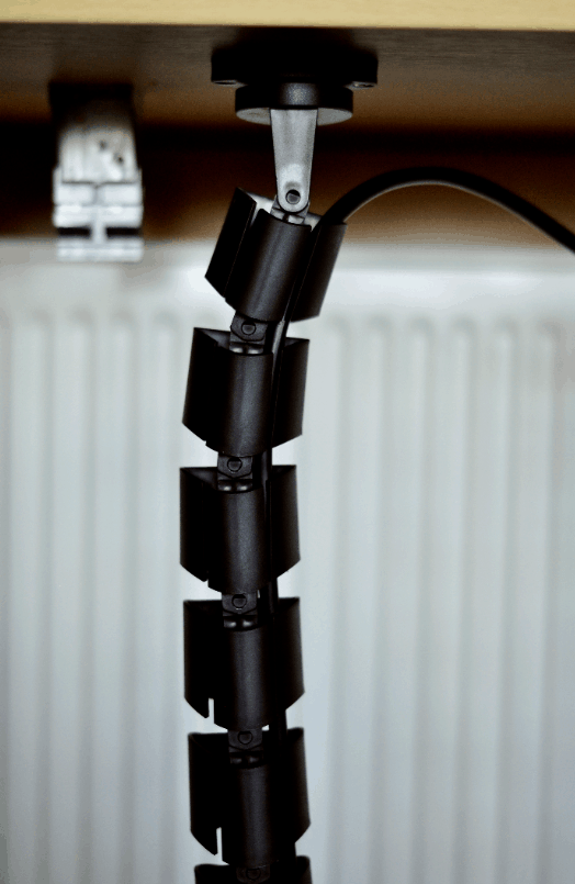 Кабелна спирала от под към бюро, 0.8м дължина, с метална основа и фиксатор към бюро, цвят Черен ABL